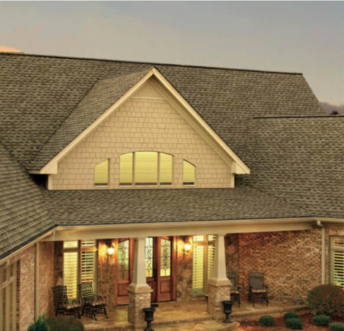 Home with an asphalt shingle roof